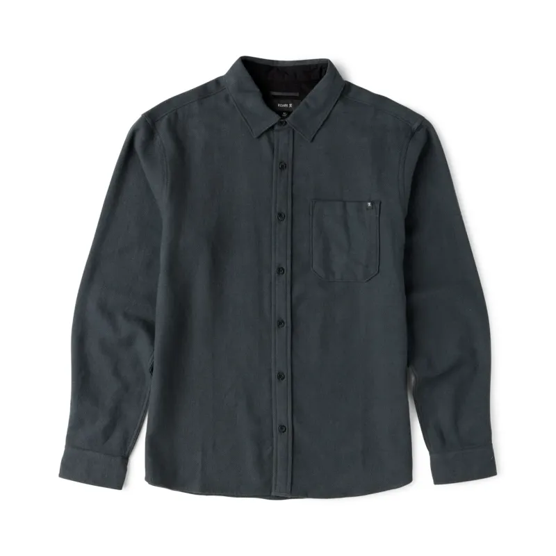 Front view of the Dark Charcoal flannel with black buttons, a pointed collar and single chest pocket.