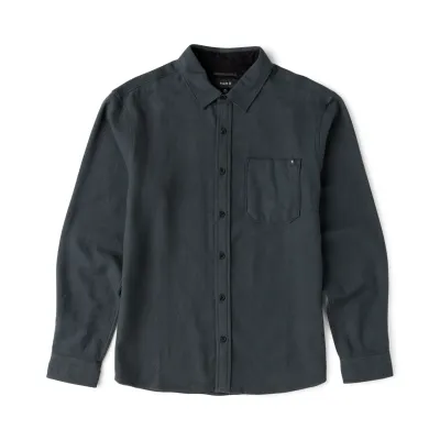 Front view of the Dark Charcoal flannel with black buttons, a pointed collar and single chest pocket.