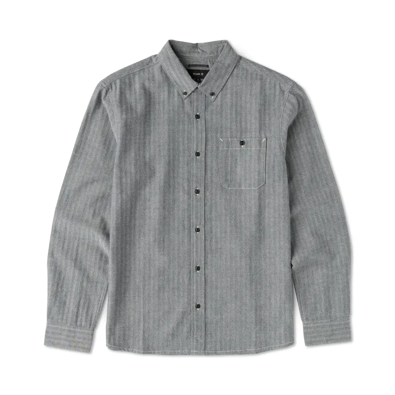 Front product view of the Indigo chambray shirt with a button-down collar and buttoned chest pocket.