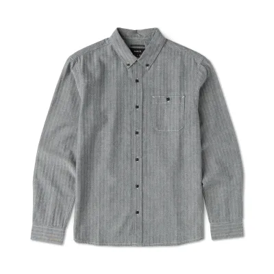Front product view of the Indigo chambray shirt with a button-down collar and buttoned chest pocket.