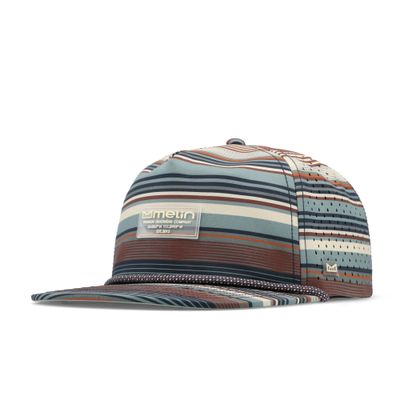 Angled view of the Melin Coronado Brick Hydro hat with multicolor stripes, flat visor, rope, and front patch.
