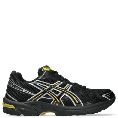 Opposite side view of ASICS GEL-1130 shoe showing patent overlays and yellow GEL cushioning.