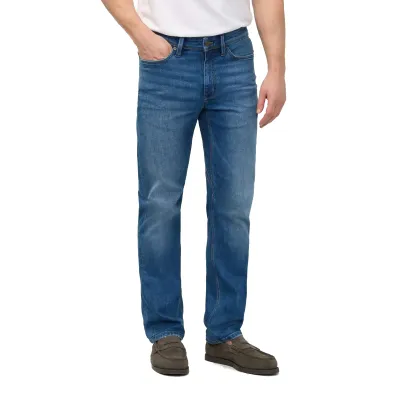 Front view of the Alpine Indigo jeans showing the trim hip, thigh and straight-leg fit.