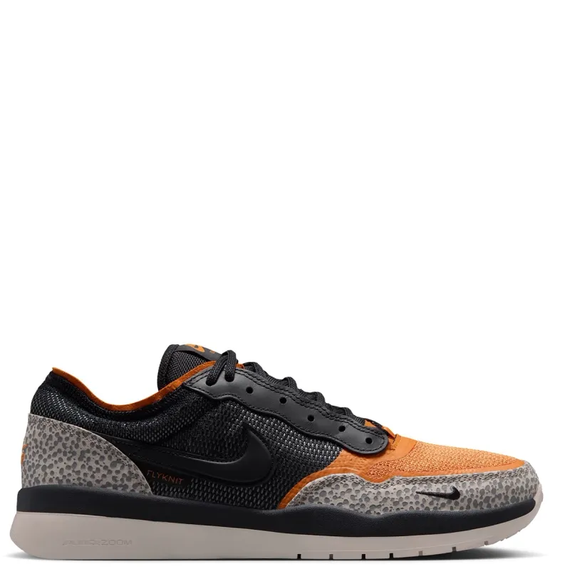 Medial profile of Nike SB PS8 showing layered Flyknit, leather Swoosh and Air Zoom midsole.