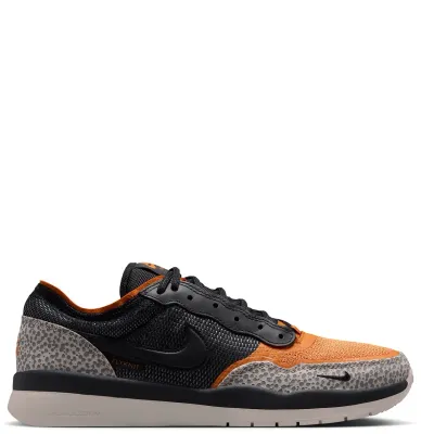 Medial profile of Nike SB PS8 showing layered Flyknit, leather Swoosh and Air Zoom midsole.