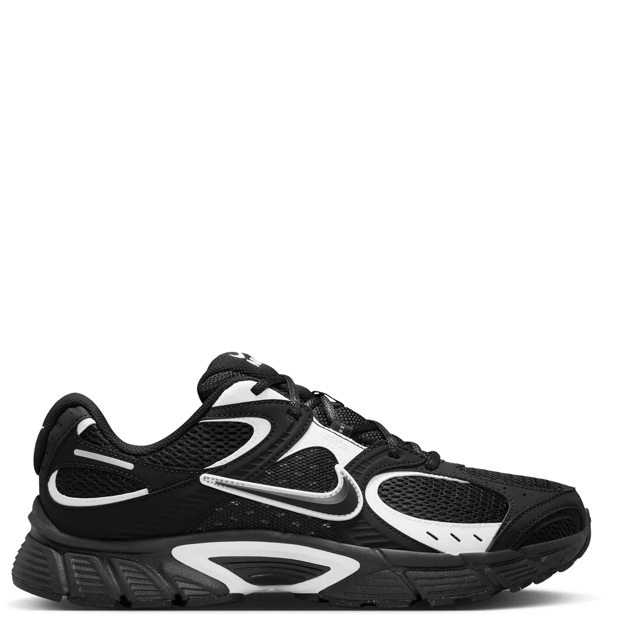 Medial side view of Nike V5 RNR featuring black mesh, white synthetic overlays and a chunky foam midsole.