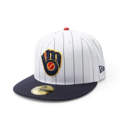 Angled front view of white pinstripe Brewers 59FIFTY hat with Ball &amp; Glove logo and navy bill