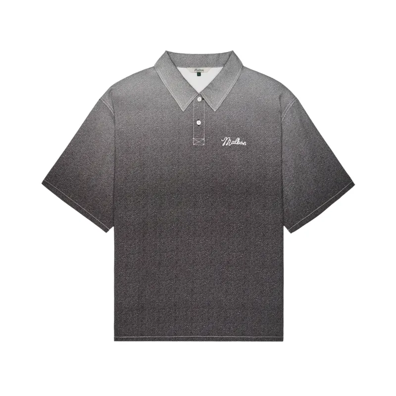 Front view of the black Malbon Golf Ironfade polo showing its faded print and relaxed shape