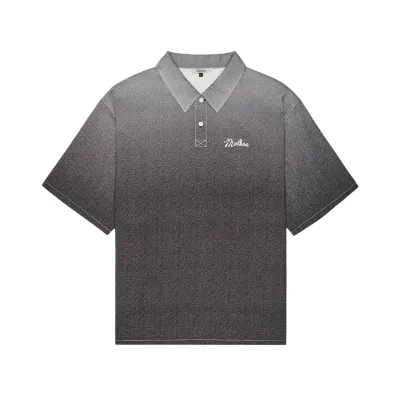 Front view of the black Malbon Golf Ironfade polo showing its faded print and relaxed shape