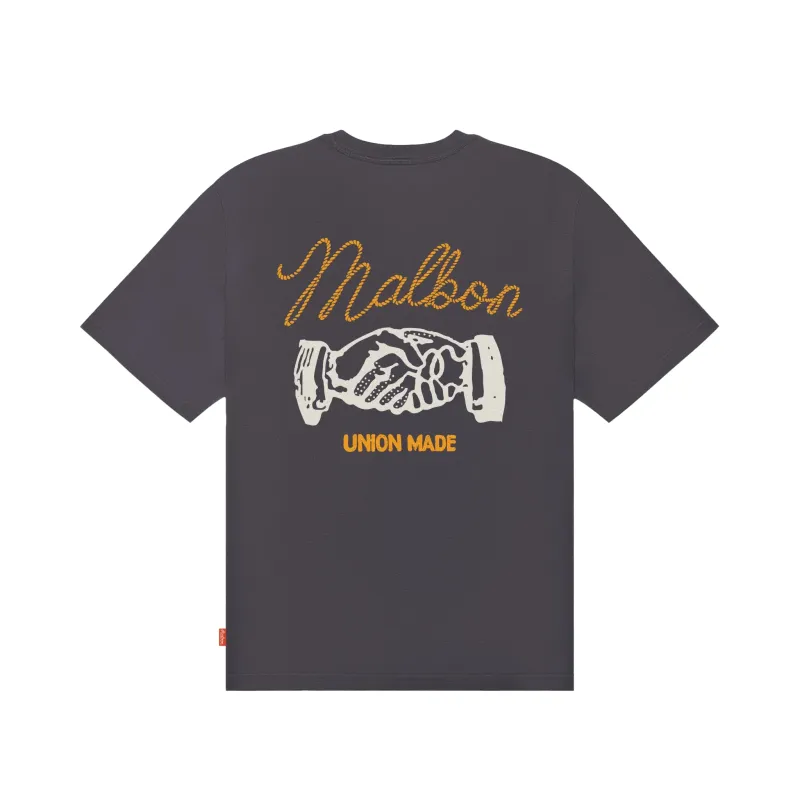 Back view of the black Malbon Vista Union Made tee showing Malbon script and handshake artwork