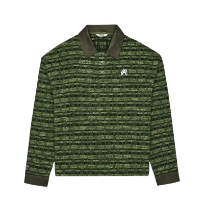 Front view of the olive Malbon Golf Wabi polo showing its patterned body and contrast trim