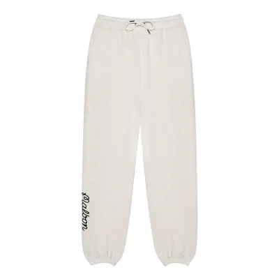 Front view of the Malbon Clubhouse sweatpants showing the drawcord and lower-leg script