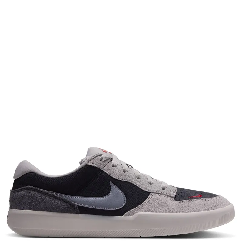 Opposite side view of the Nike SB Force 58 with a red toe Swoosh and layered suede upper.