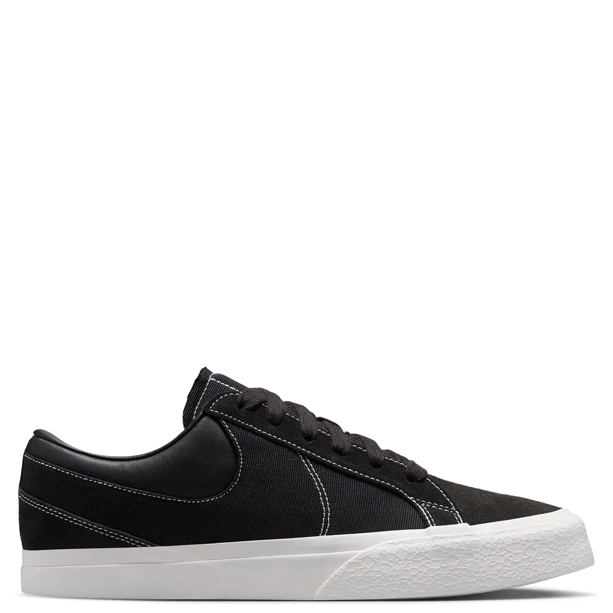 Opposite side view of the black Nike Blazy with suede toe, canvas quarter panel and stitched Swoosh.