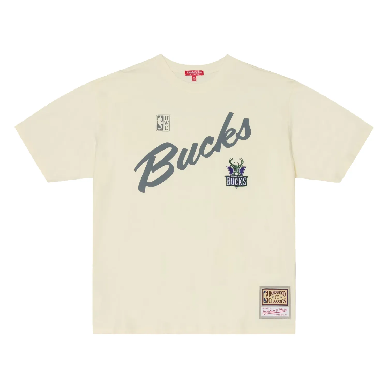 Front view of the women’s cream Bucks oversized tee with script graphic, embroidered logo and woven jock tag.