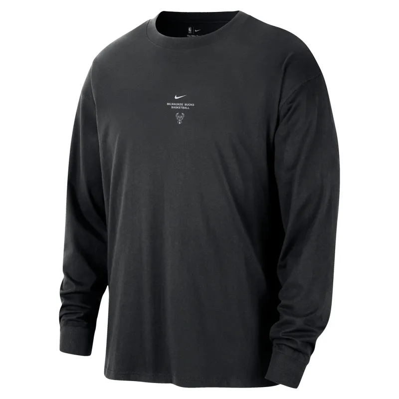 Front view of the black Nike Bucks long sleeve top with small team graphics at the center chest.