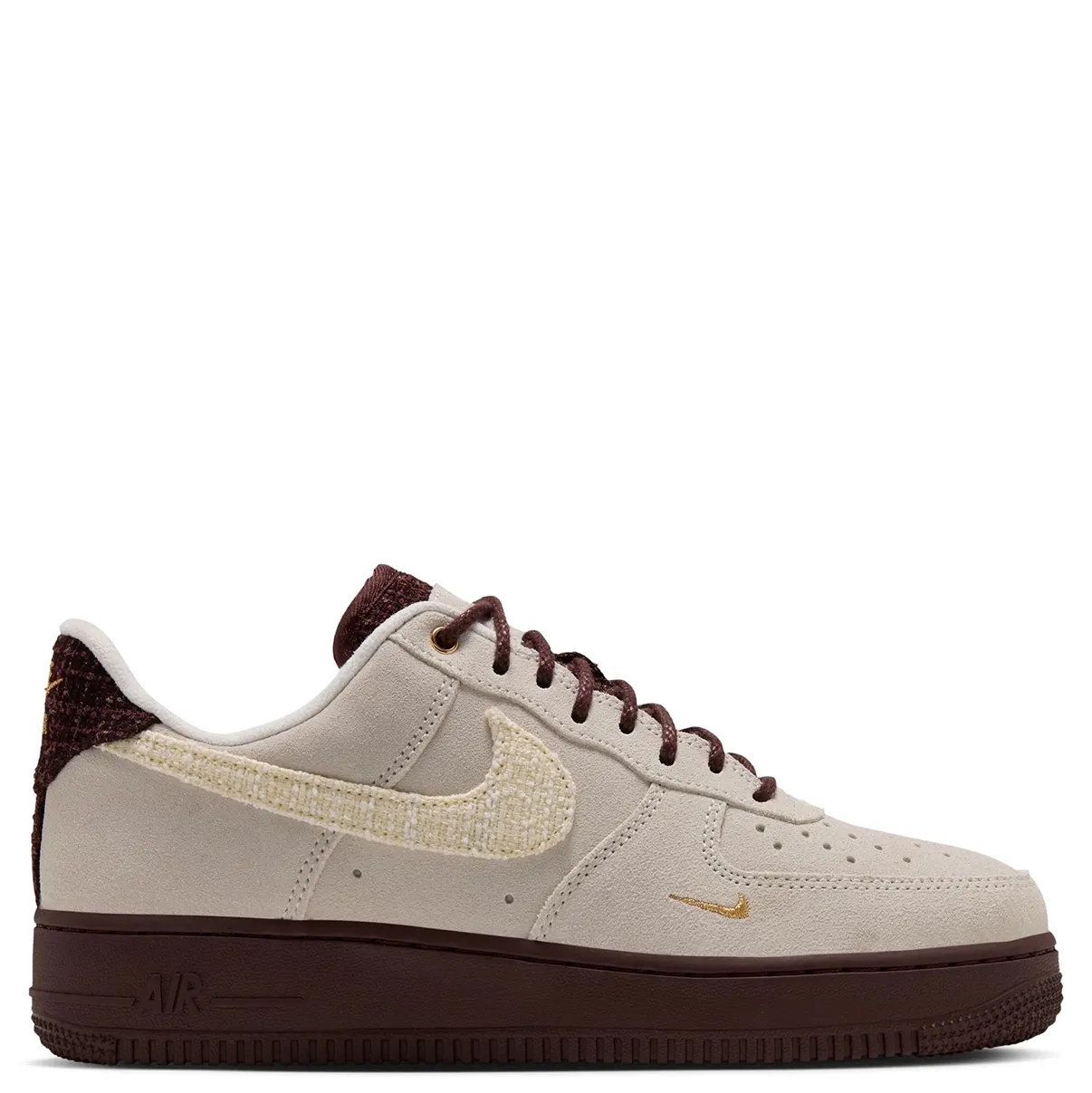 Opposite side view of the Sail Nike Women’s Air Force 1 ’07 with a small gold toe Swoosh