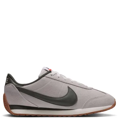 Opposite side view of the Sail Nike Women’s Pacific Suede with gum outsole accents