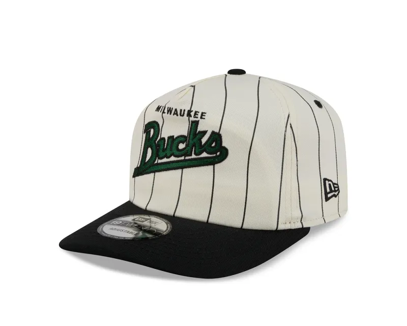 Angled front view of the cream Bucks Pinstripe 19TWENTY Hat with green script embroidery and a black visor.