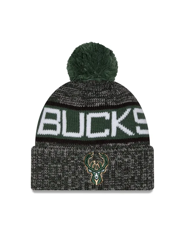 Front view of the New Era Bucks Tricolor Pom Beanie with white Bucks lettering, a deer logo and green pom.