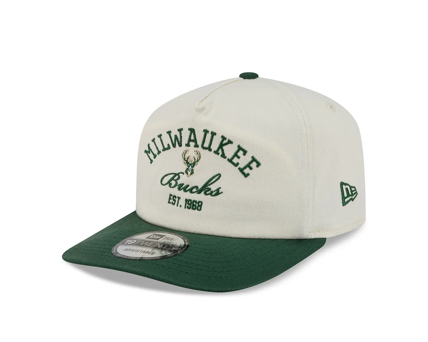 Angled front view of the cream New Era Bucks Stacked 19TWENTY Hat with green embroidery and visor.