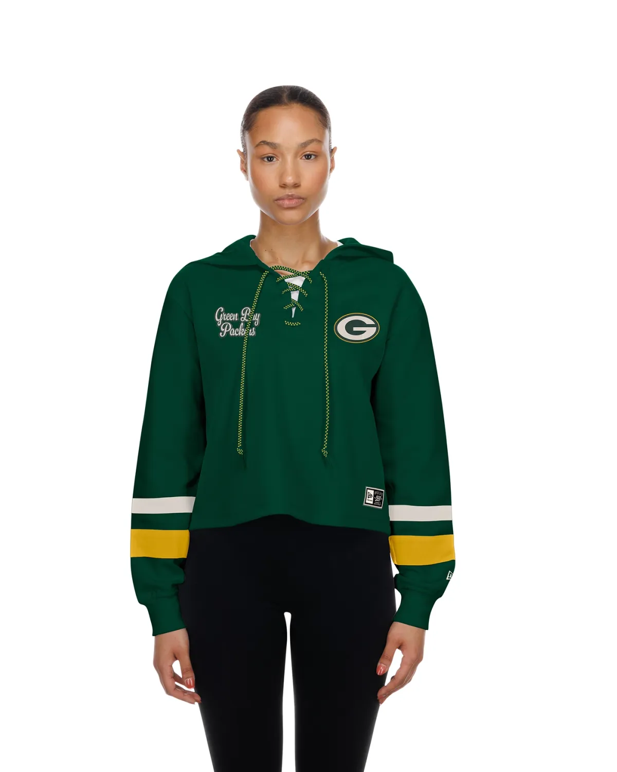 Front view of a model wearing the green New Era Packers Lacer hoodie with lace-up neckline and striped sleeves