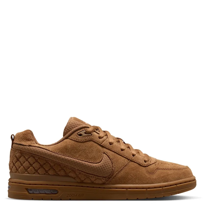Opposite side profile of the tan Nike SB Paul Rodriguez Low with a gum cupsole and visible heel cushioning.