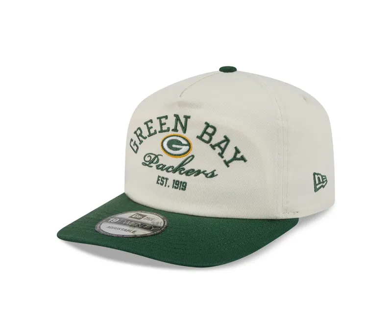 Angled front view of the cream New Era Packers Stacked 19TWENTY Hat with green embroidery and visor.