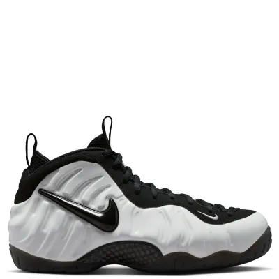 Outer side view of Nike Air Foamposite Pro Premium Glow with a glossy black Swoosh on the molded white upper.