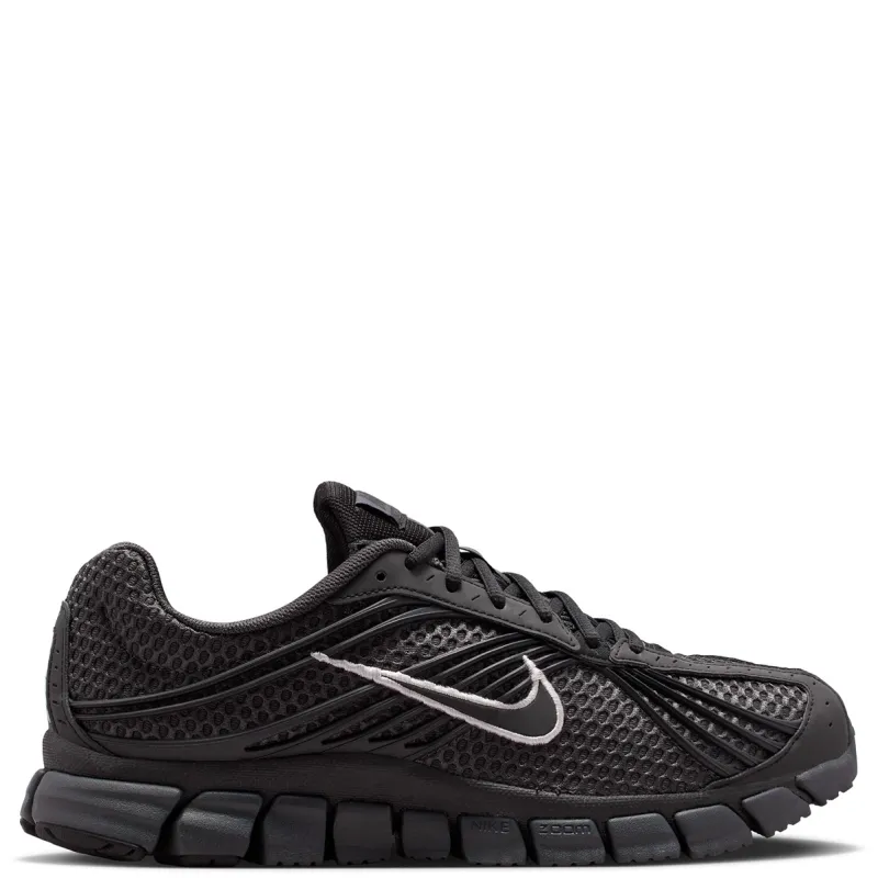 Opposite side view of Nike Zoom Skylon 11 with dark mesh panels, silver Swoosh and deep flex grooves.