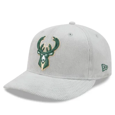 Front left angled view of grey Bucks corduroy 59FIFTY hat with embroidered deer logo and green New Era flag.