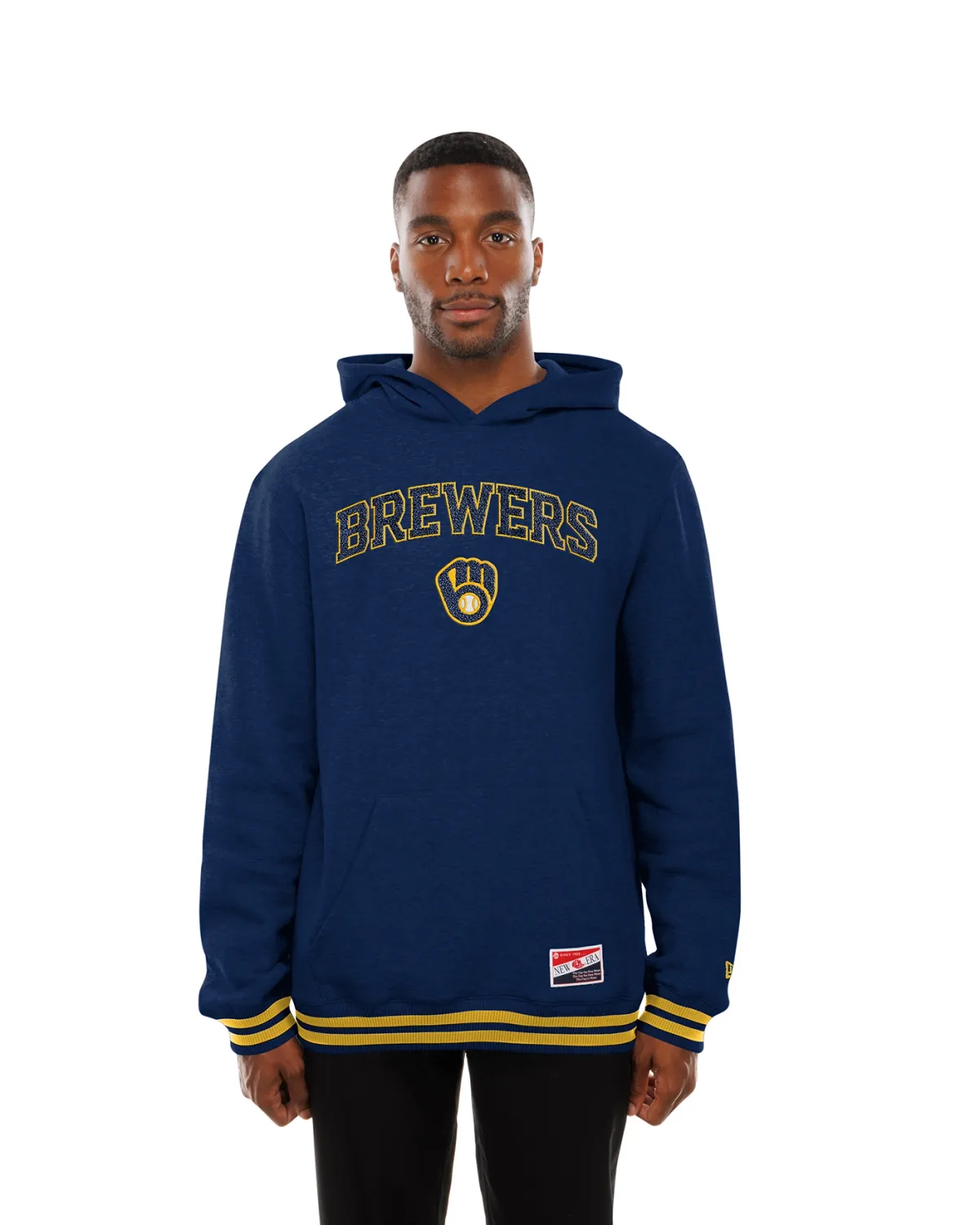 Model wearing the navy New Era Brewers Chenille Wordmark Hoodie, showing the front graphics and pouch pocket.