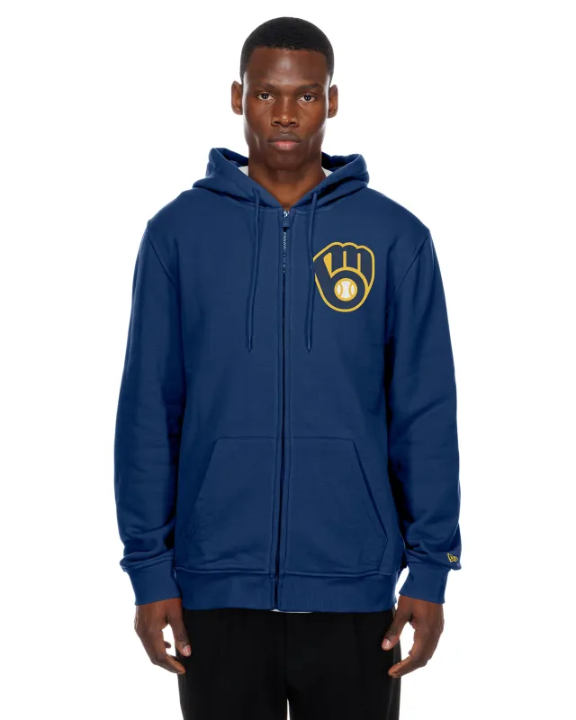 Model wearing the navy Brewers Back Hit Full-Zip Hoodie, showing the chest logo, zipper and front pockets.