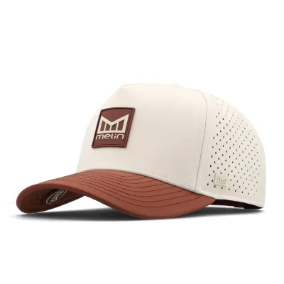 Angled front view of Melin Odysea Stacked HYDRO hat with a Moonbeam crown, Red Ochre visor and logo patch.