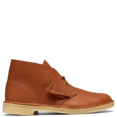 Side view of Clarks Desert Boot in Burnt Orange Leather with branded leather fobs and a natural crepe sole.