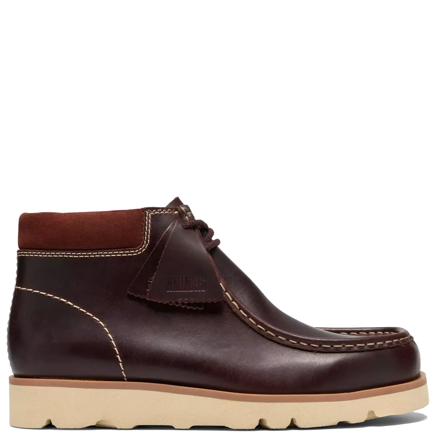 Side view of Clarks Walla Orkhon in British Tan leather with contrast stitching, suede collar and a light Vibram sole.