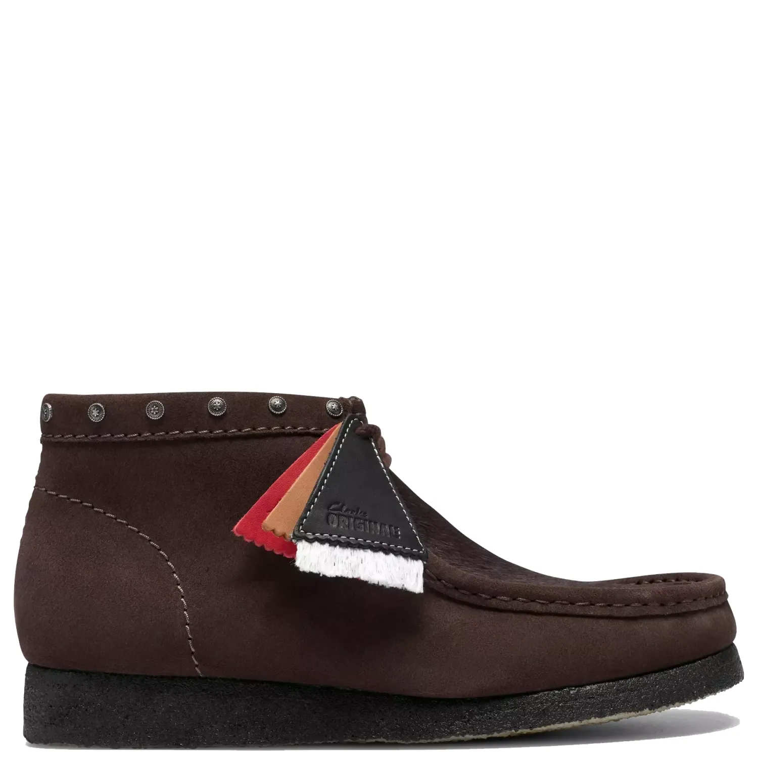 Side view of Clarks Wallabee Boot in Brown Interest with collar studs, collectible fobs and a black-sprayed crepe sole.
