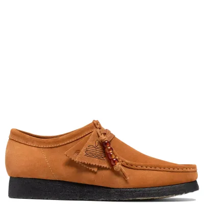 Side view of Clarks Wallabee in Ginger Suede with bead detailing, decorative fobs and a black-sprayed crepe sole.