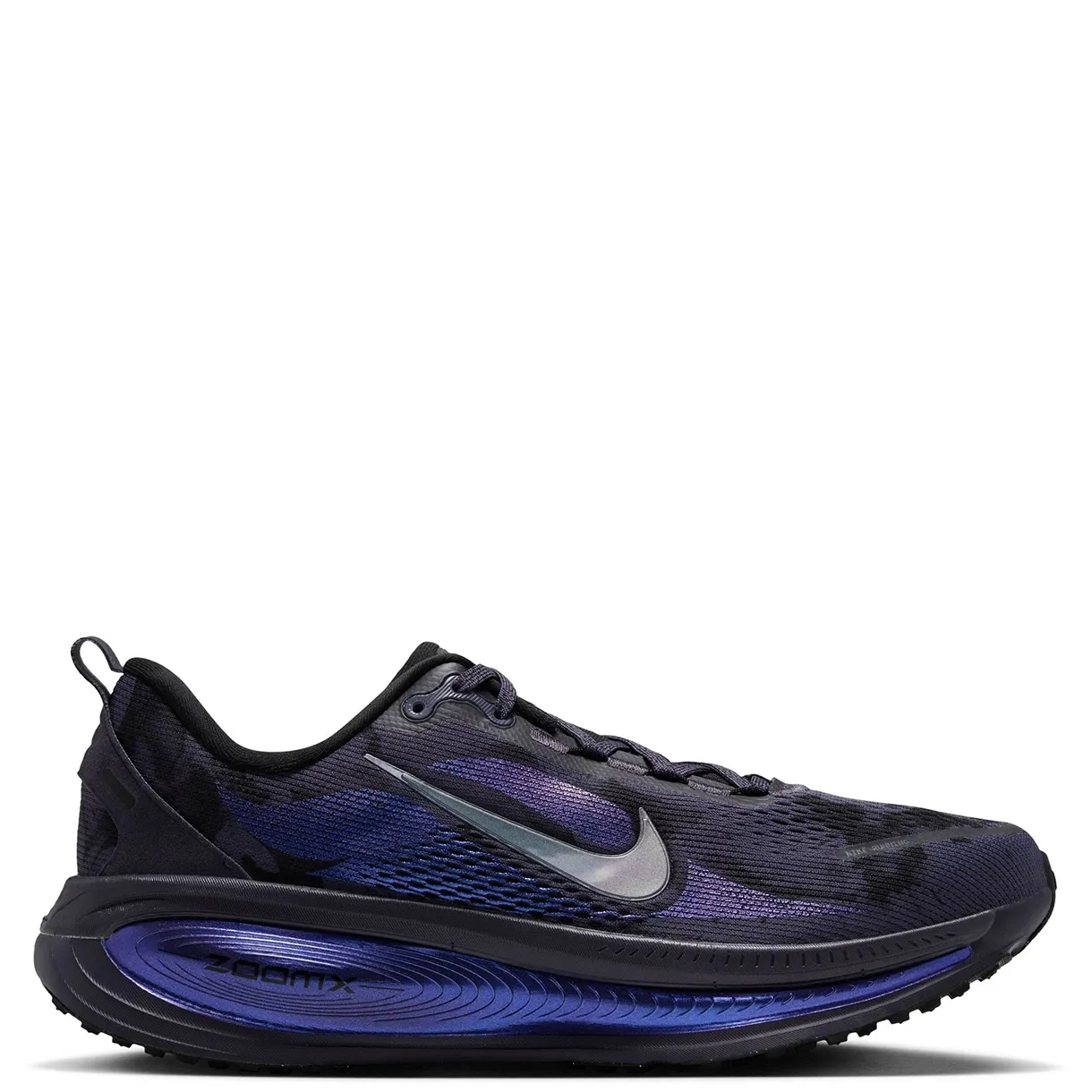 Opposite side view of Nike Vomero 18 with breathable mesh, a grey Swoosh and blue-purple cushioning.