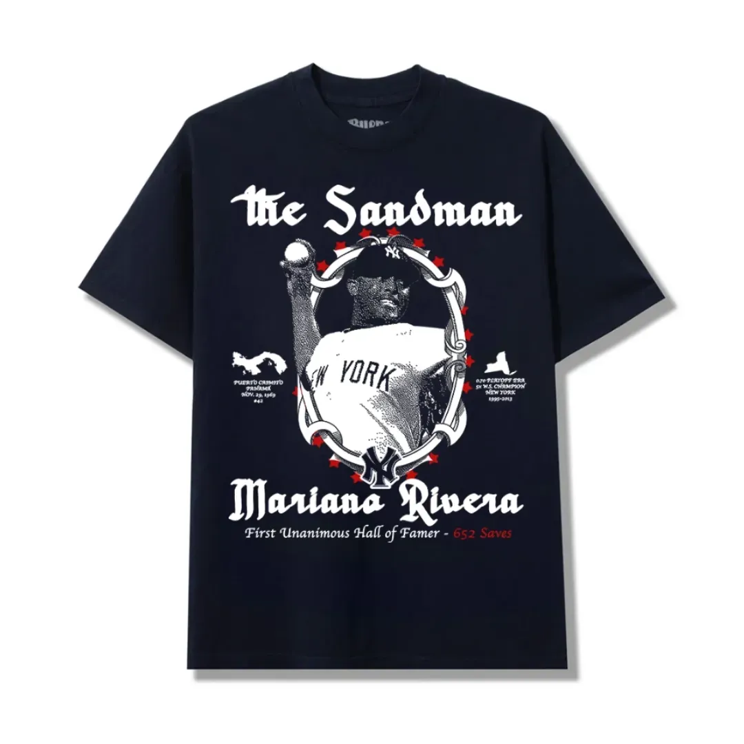 Navy Bueno Mariano tee with a screen-printed Rivera portrait, The Sandman lettering and red-and-white career details.