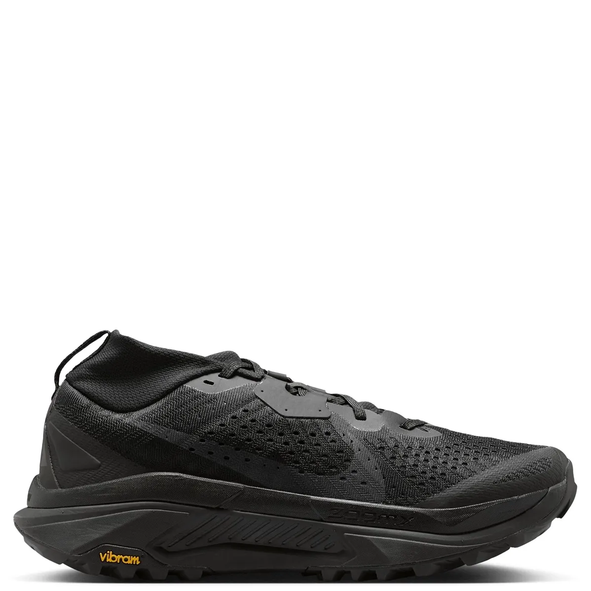 Opposite side view of black Nike ACG Zegama Trail showing a tonal Swoosh and yellow Vibram branding.
