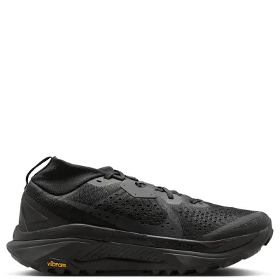 Opposite side view of black Nike ACG Zegama Trail showing a tonal Swoosh and yellow Vibram branding.