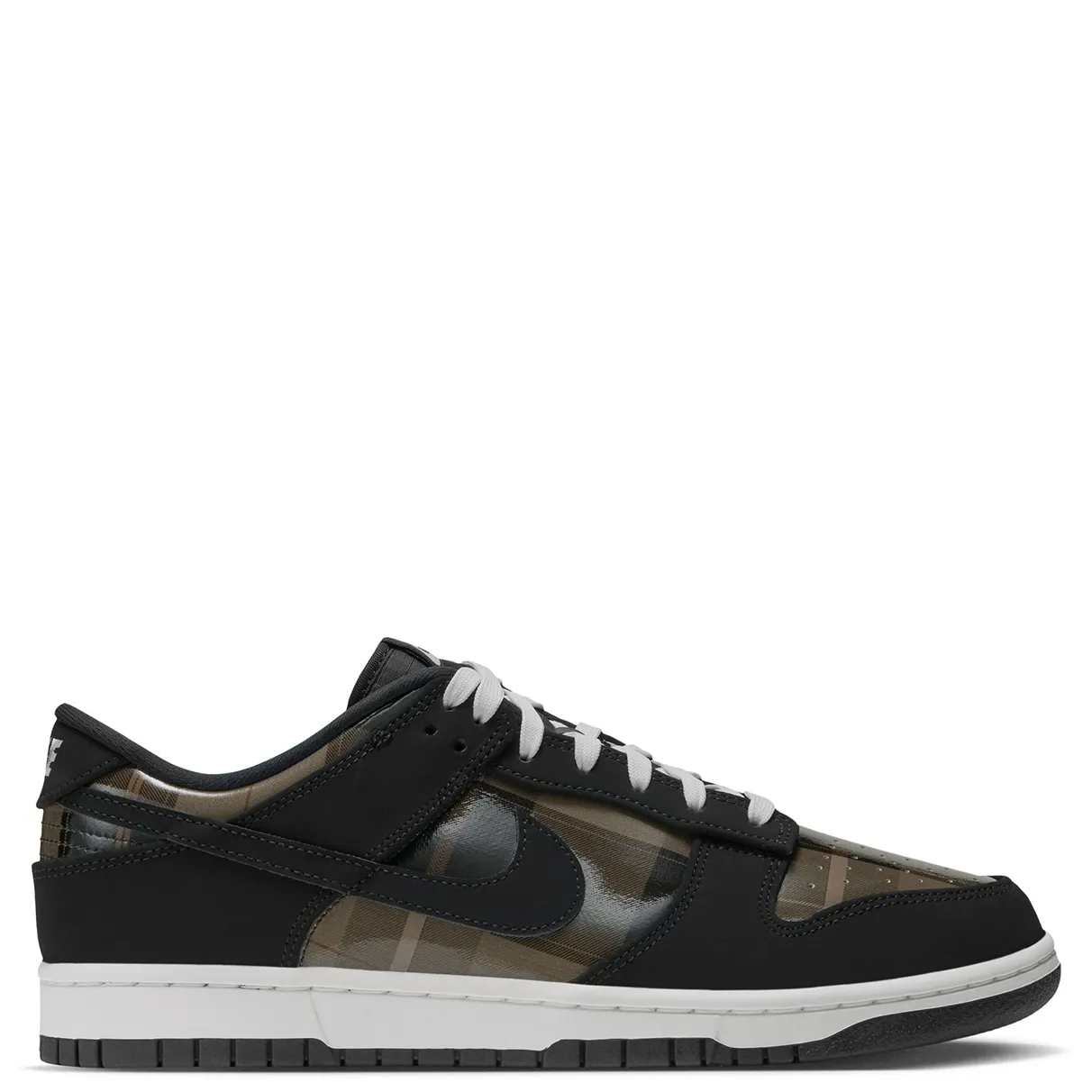 Nike Dunk Low Retro opposite side view showing a black Swoosh over glossy plaid and a black outsole.