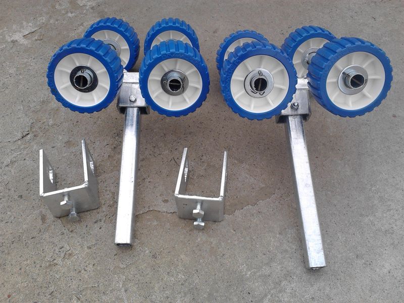 Boat trailer roller carriages (pair of four rollers)