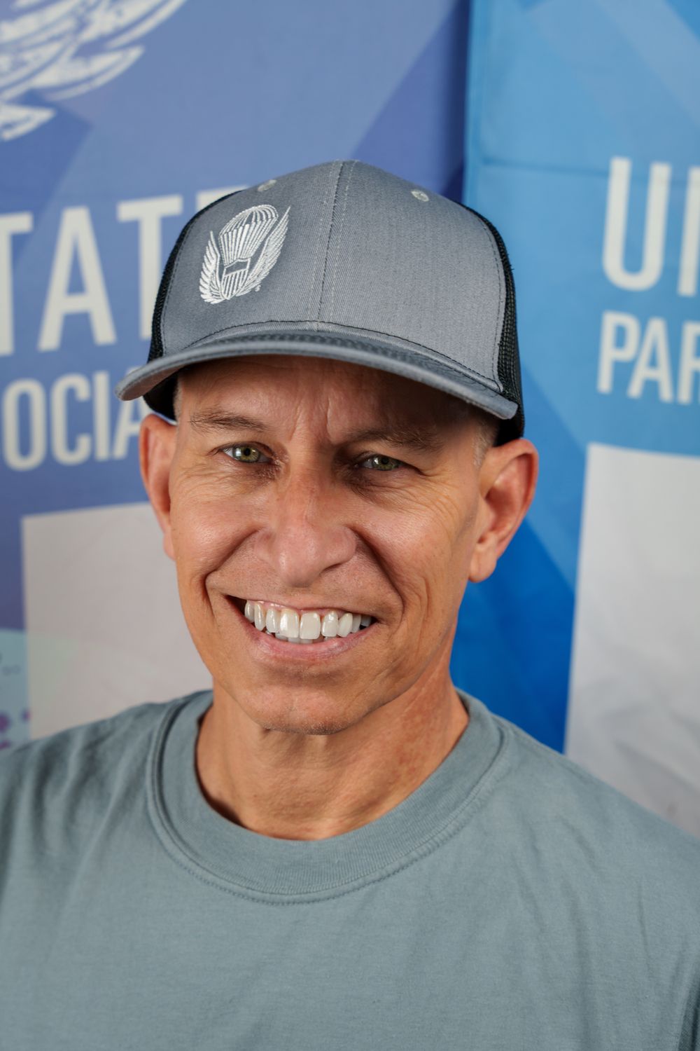 Port Authority® Snapback Trucker Cap