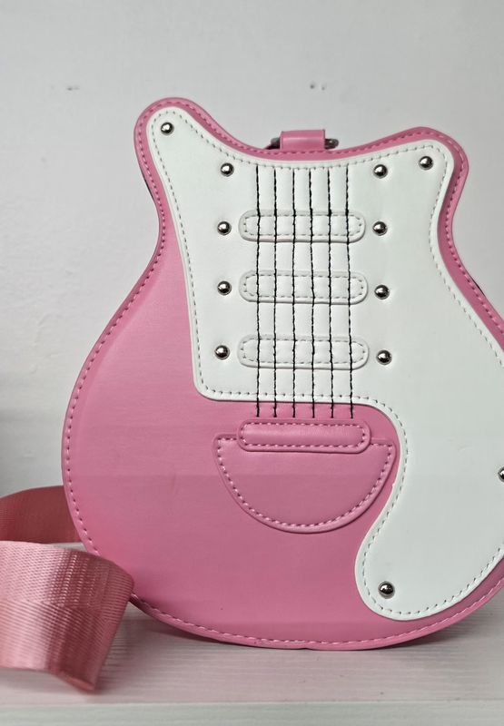 Purse Pink guitar