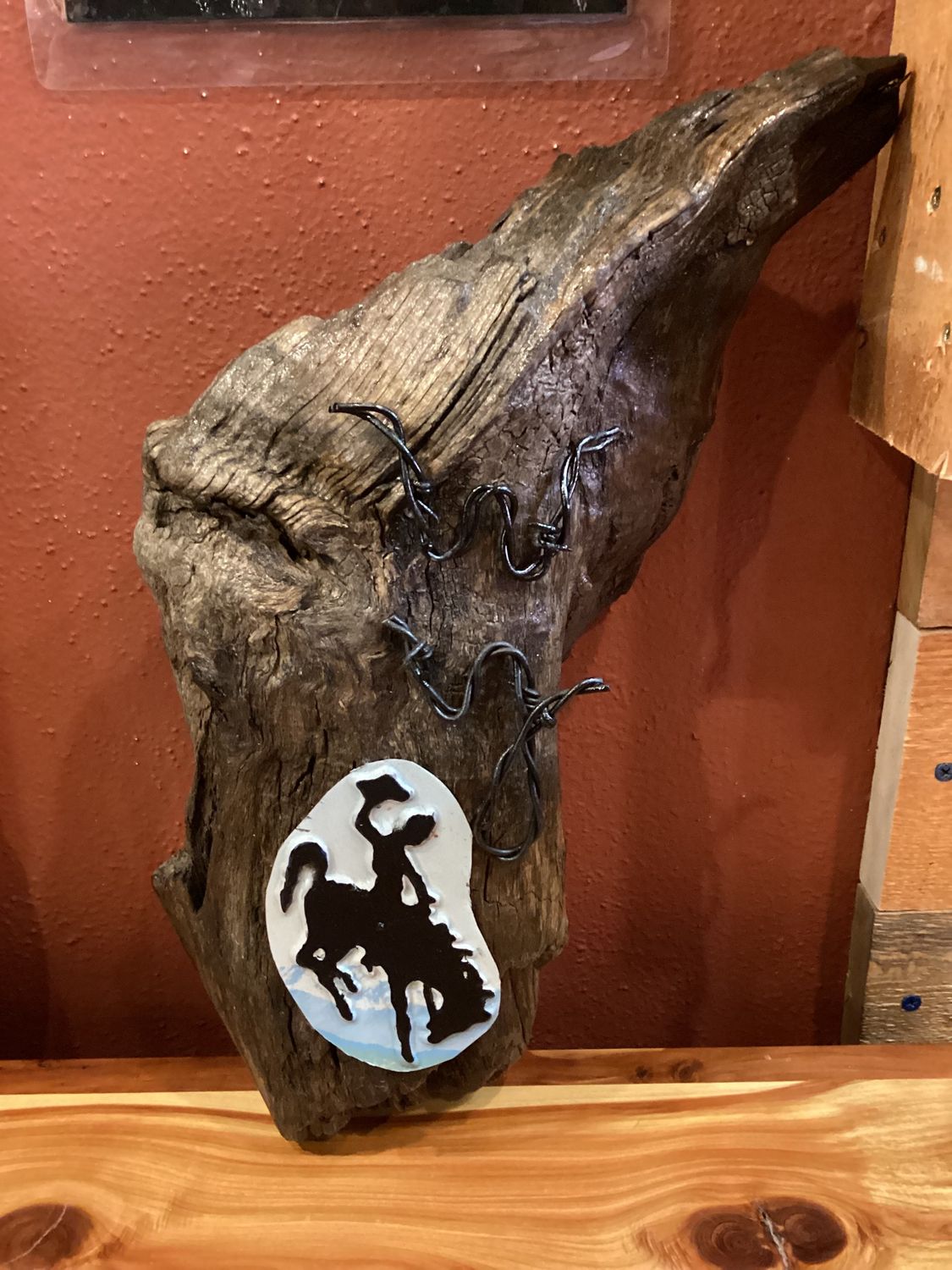 Wyoming Driftwood, Design: License Plate Cowboy
