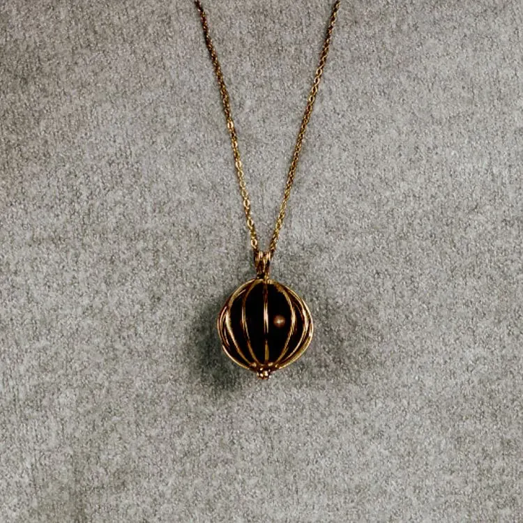 Schmuckset Harmony vergoldet (Käfiganhänger, Kette 70 cm, eine Natursteinkugel nach Wahl)