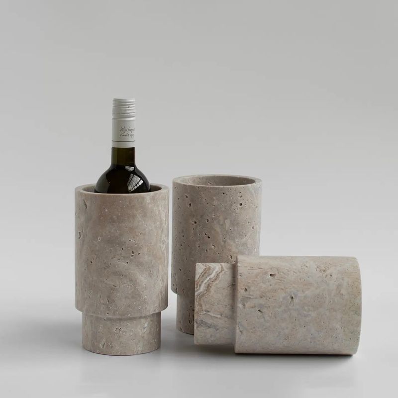 SILBERNE TRAVERTIN VASE AND WINE COOLER SILBERNE TRAVERTIN VASE AND WINE COOLER