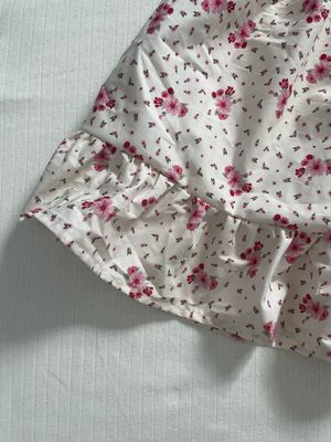 Roses in cream skirt